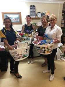 Emerald Neighbourhood Centre Volunteers with Linking Alms for Christmas hampers