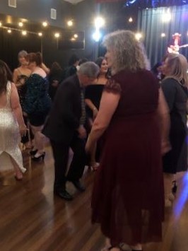 Emerald Neighbourhood Centre Sparkles Ball guests dancing the night away